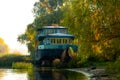 Abandoned old ship on a riverside.