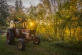 Abandoned old tractor sunset shot Royalty Free Stock Photo