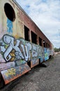 Abandoned old train with rust and graffitis