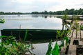 Abandoned Old Wooden Fishing Boat Near Pier In Summer Lake Or River. Beautiful Summer Sunny Day Or Evening. Forsaken Boat Royalty Free Stock Photo