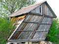 Abandoned old wooden small curved house