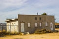 Abandoned One Story Building With Boarded Up Windows & Doors Royalty Free Stock Photo