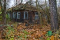 Abandoned one-story wooden house in non-residential part of Chernobyl, exclusion zone of Chernobyl NPP, Ukraine