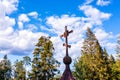 Abandoned Orthodox Church in the forest, Galgauska, Latvia, cross on the roof dome, close-up Royalty Free Stock Photo