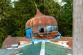 Abandoned Orthodox Church in the forest, Galgauska, Latvia, ruined tower with a dome Royalty Free Stock Photo