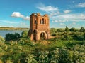 Abandoned Orthodox church on lake shore from drone Royalty Free Stock Photo