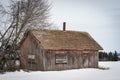 abandoned outhouse on a field Royalty Free Stock Photo