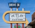 Abandoned Outlaw Tattoo sign and store on Route 66