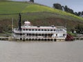 Abandoned paddle wheel river boat on shore of San Francisco bay side profile Royalty Free Stock Photo