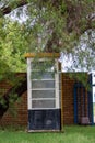 Abandoned phone box isolated