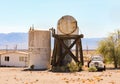 An abandoned place with a tanker trucks and tanks