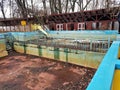 Abandoned pool and building Royalty Free Stock Photo