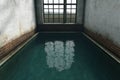 Abandoned Pool Interior: A Reflection of Decay in an Old Building Royalty Free Stock Photo