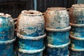 Abandoned pottery bowls stacked outside