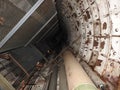 An abandoned prison in an underground bunker. A former Soviet cold war bomb shelter. The sealed door of the bunker. Pipes and