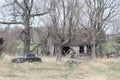 Abandoned Property with Car and Buildings Royalty Free Stock Photo