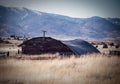 Abandoned Quonset Shed in a Field