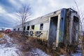 Abandoned railroad car in field with snow Royalty Free Stock Photo
