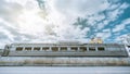 Abandoned railway buffet car with road in front