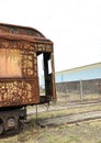 Abandoned railway train car on track siding. Royalty Free Stock Photo