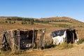 Abandoned Roadside Farm Stalls on Cold Dry Winter Landscape