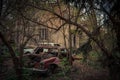 Abandoned and robbed old cars standing in the open air