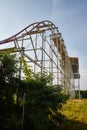 Abandoned Roller Coaster Amidst Overgrowth, Ground Up View