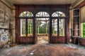 Abandoned room with view through beautiful broken conservatory Royalty Free Stock Photo