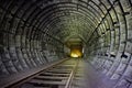 Abandoned round subway tunnel under construction. Royalty Free Stock Photo