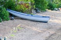 Abandoned rowboat on the beautiful beach