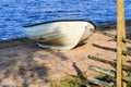 Abandoned rowboat on the beautiful beach Royalty Free Stock Photo