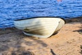 Abandoned rowboat on the beautiful beach