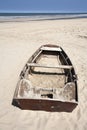 Abandoned rowing boat on the beach