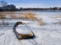 Abandoned Rowing Boat Full Of Ice And Snow