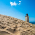 Abandoned Rubjerg Knude Lighthouse and sand dunes, North Sea coast, Denmark Royalty Free Stock Photo