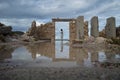 Abandoned Ruin with Woman in Doorway at Bay of Firopotamos in Mi Royalty Free Stock Photo