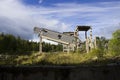 abandoned ruined building. concrete walls with broken windows and a lift, industrial buildings. victory of nature over Royalty Free Stock Photo