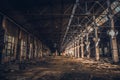 Abandoned and ruined dark industrial creepy warehouse inside with columns, corridor or tunnel view, old grunge factory building Royalty Free Stock Photo