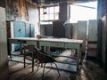 Abandoned ruined house with furniture after war or disaster, old building inside interior Royalty Free Stock Photo