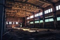 Abandoned ruined industrial factory building, corridor view with perspective, ruins and demolition concept