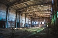 Abandoned ruined industrial factory building, corridor view with perspective, ruins and demolition concept Royalty Free Stock Photo