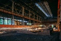 Abandoned ruined large industrial building with garbage waiting for demolition Royalty Free Stock Photo