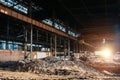 Abandoned ruined large industrial building with garbage waiting for demolition Royalty Free Stock Photo