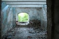 An abandoned ruined room with fragments of a wall of bricks. The aftermath of the war, the bombing. decadence Royalty Free Stock Photo