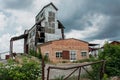 Abandoned ruined scary old grain plant in the forgotten village