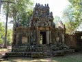 Abandoned ruins of an old stone structure from the Khmer period in a Cambodian jungle Royalty Free Stock Photo