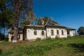 Abandoned rural house with green door in Parkhomivka