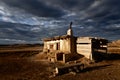 Abandoned rural house landscape dramatic cloud sky