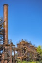 Abandoned rusted old machines and storage units in a gas industry at gas works park Seattle Royalty Free Stock Photo