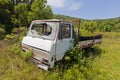 Abandoned and rusted truck in field Royalty Free Stock Photo